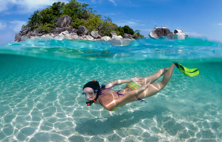 Easy snorkeling in Bermuda’s clear shallow waters during an overnight cruise stay
