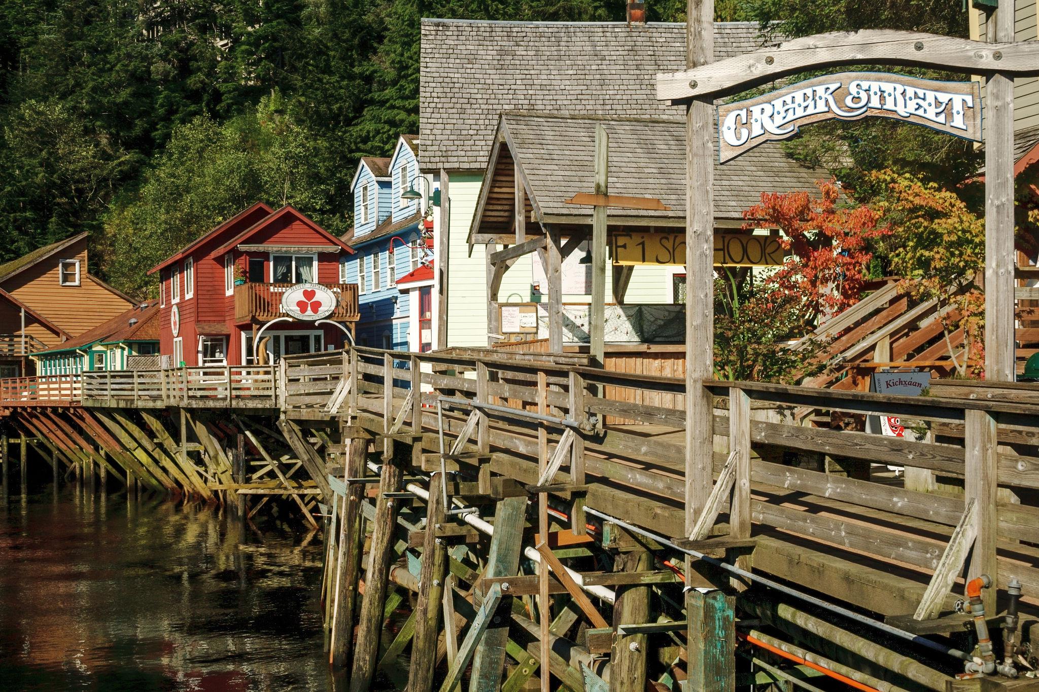 Historic Creek Street boardwalk on stilts over the water in Ketchikan, Alaska