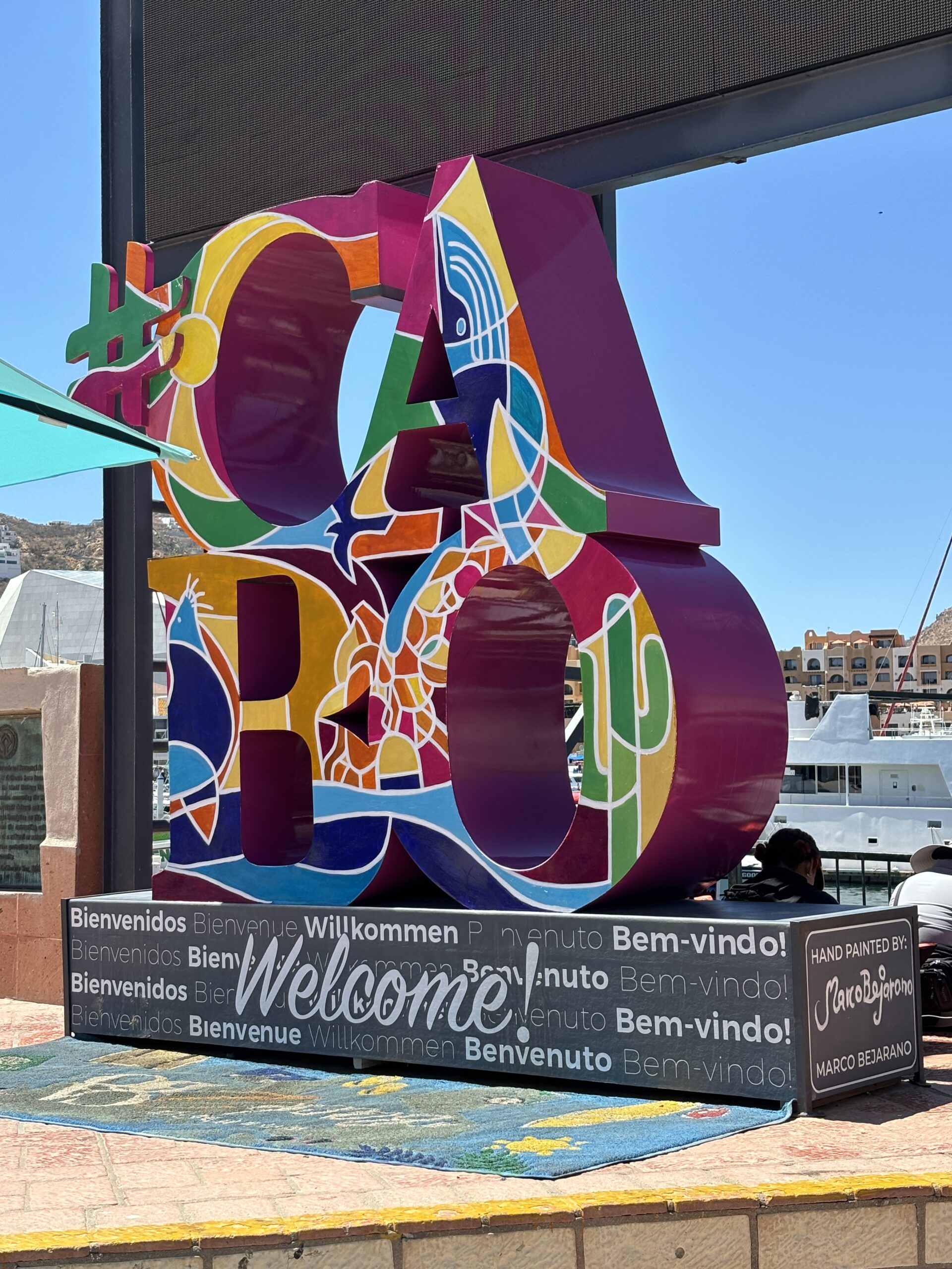 Colorful hand-painted #CABO welcome sculpture at the Cabo San Lucas marina