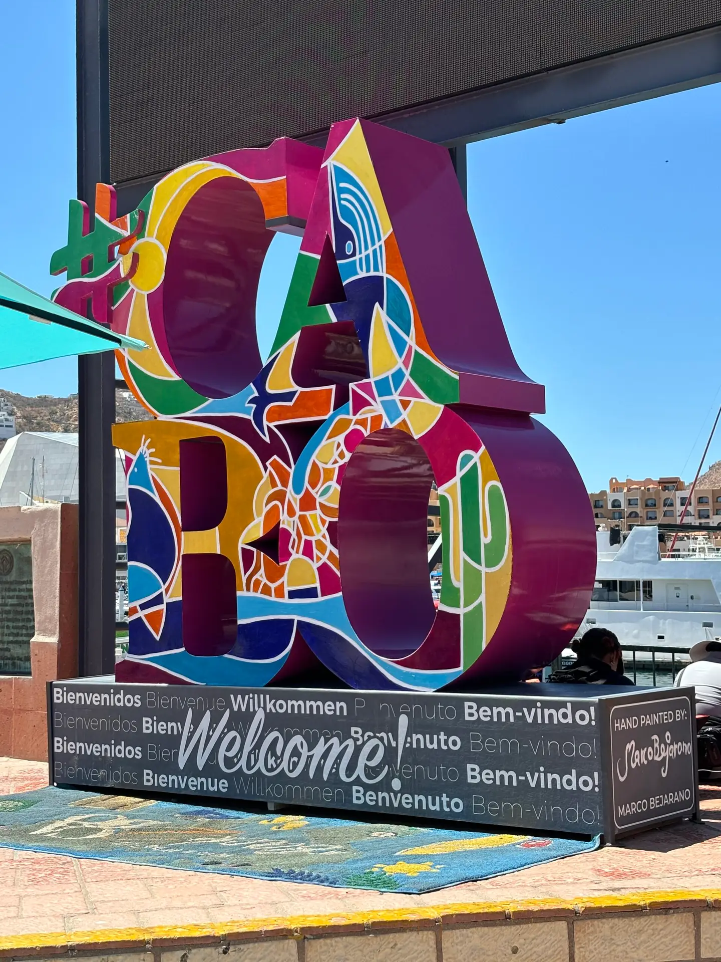 Colorful hand-painted #CABO welcome sculpture at the Cabo San Lucas marina