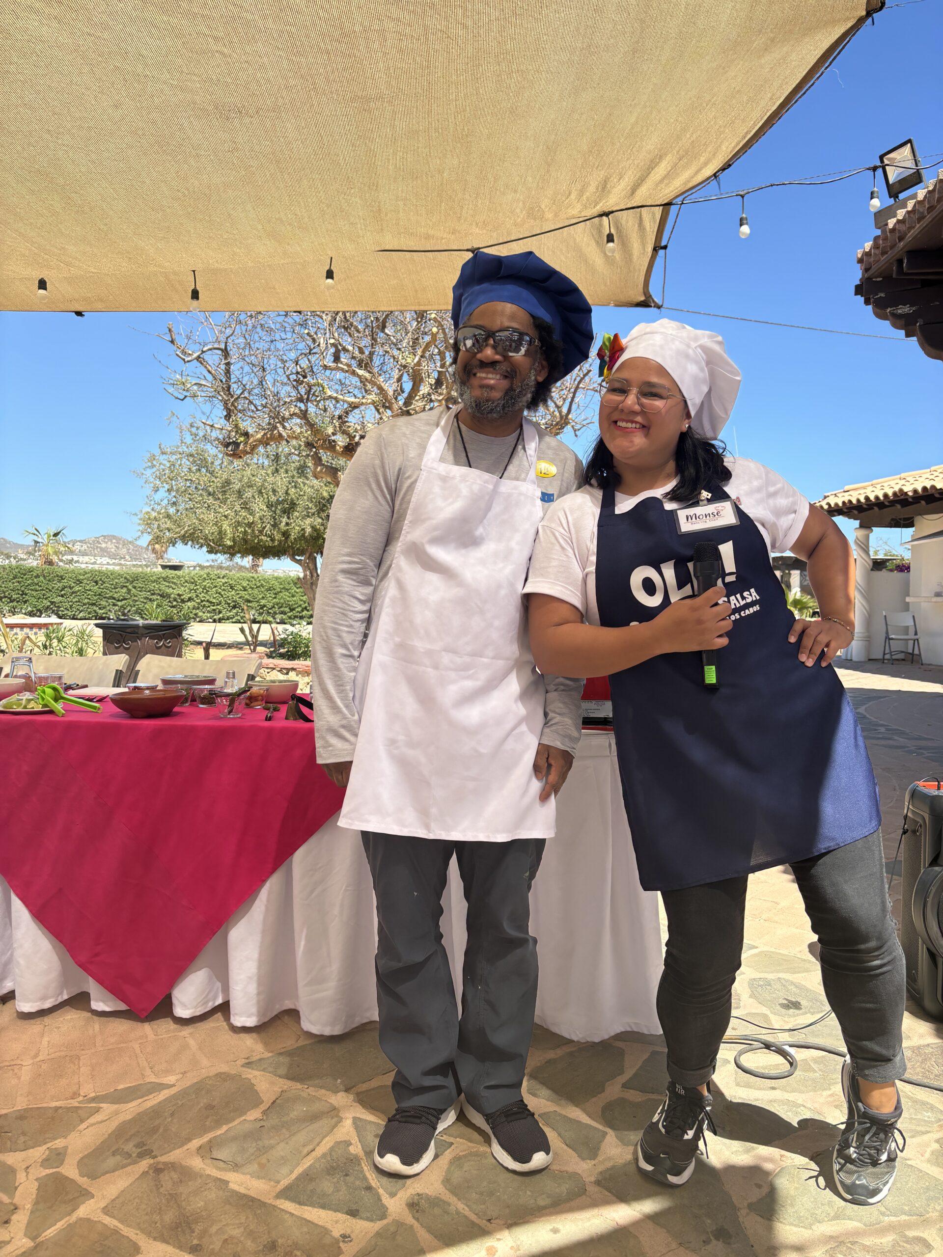 Travelers with the host at a Salsa and Salsa cooking excursion in Cabo, Mexico