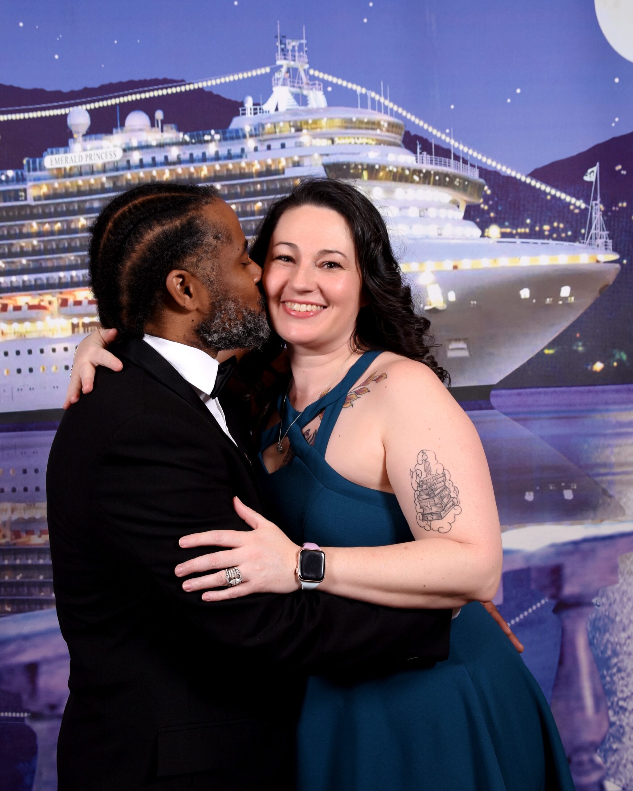 Jessica Gray and her husband dressed up on a formal night aboard a cruise